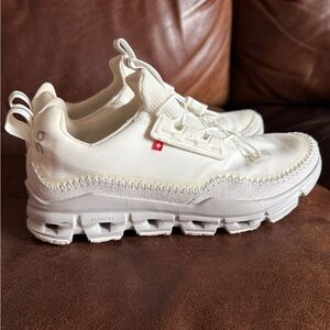 On Running Cream Sneakers with Minimalist Design